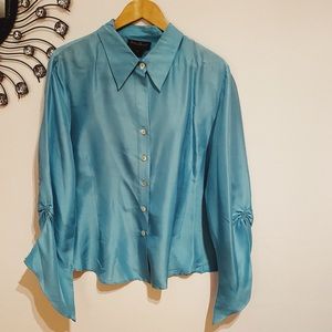 flared sleeve button down blouse.